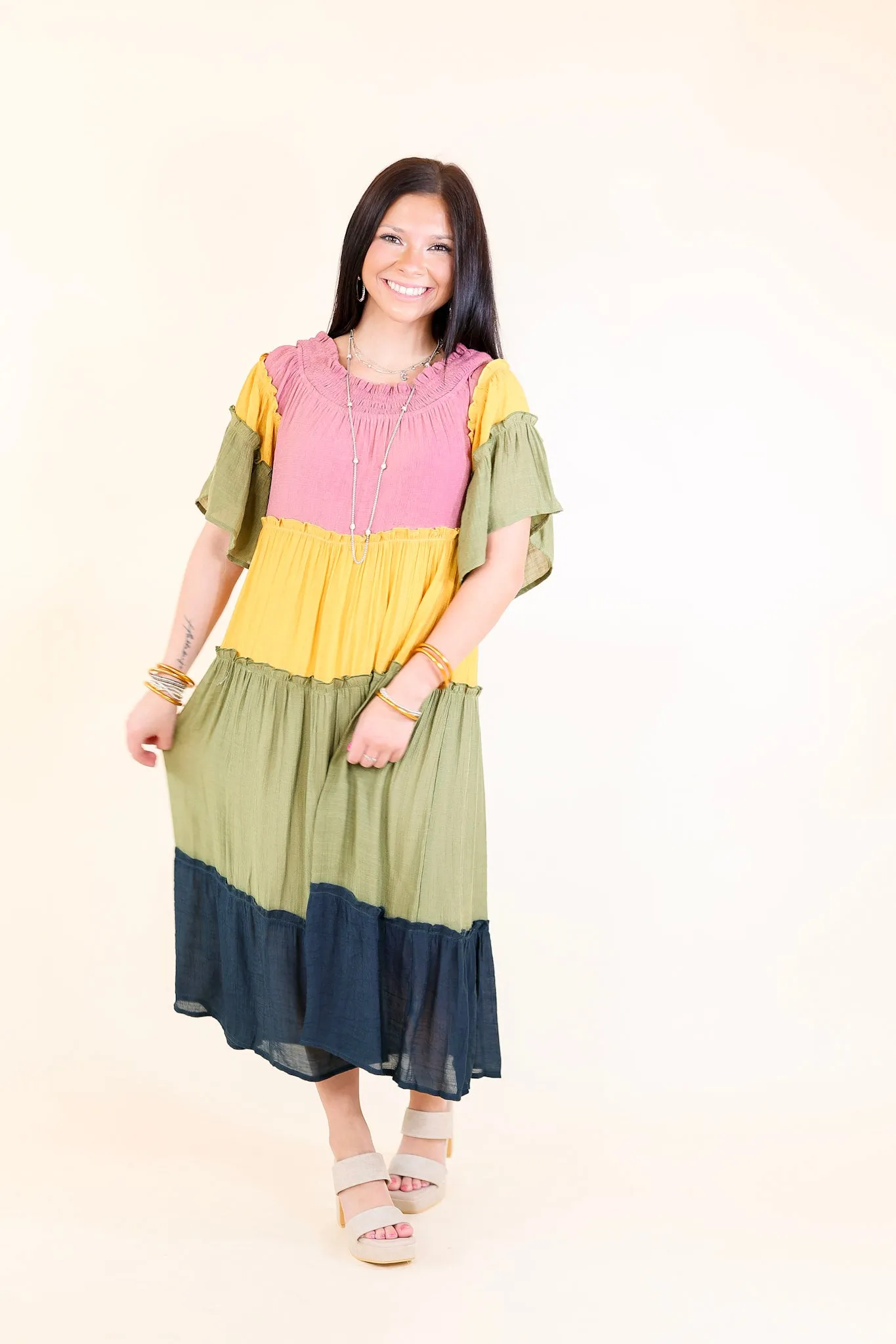 In the Villa Color Block Off the Shoulder Midi Dress in Mustard, Olive, Mauve, and Navy